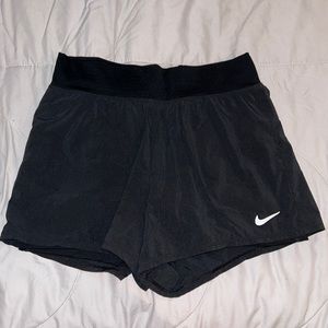 Black pockets Nike running shorts